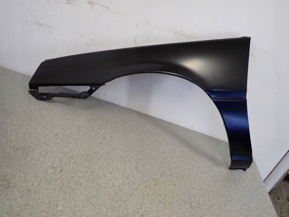 MITSUBISHI COLT LANCER 84-86 BŁOTNIK PRZEDNI LEWY 1/15