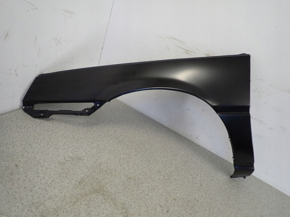 MITSUBISHI COLT LANCER 84-86 BŁOTNIK PRZEDNI LEWY 3/15