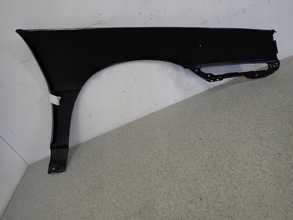 MITSUBISHI COLT LANCER 84-86 BŁOTNIK PRZEDNI LEWY 14/15