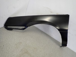 MITSUBISHI COLT LANCER 84-86 BŁOTNIK PRZEDNI LEWY 4/15 MINIATURA