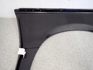 MITSUBISHI COLT LANCER 84-86 BŁOTNIK PRZEDNI LEWY 12/15 MINIATURA