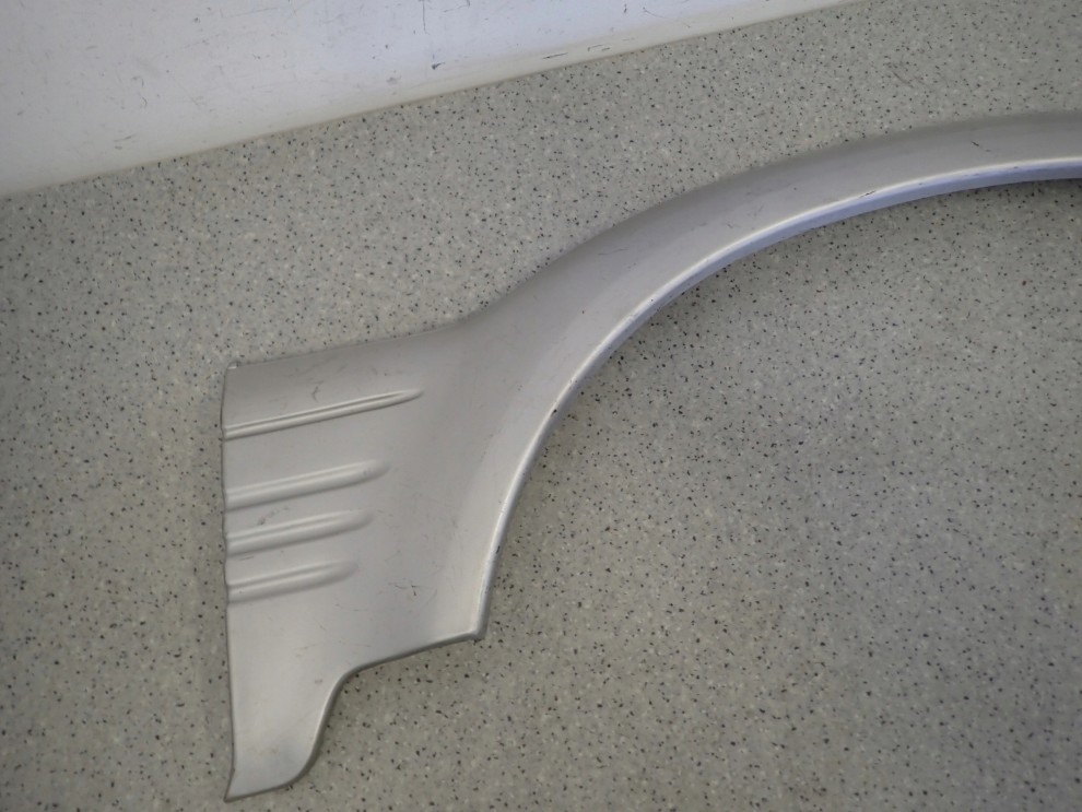 SSANGYONG MUSSO 95- LISTWA BŁOTNIKA PRZEDNIA PRAWA 2/7