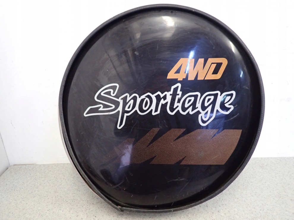 KIA SPORTAGE I 94- OBUDOWA OSŁONA KOŁA ZAPASOWEGO 1/4
