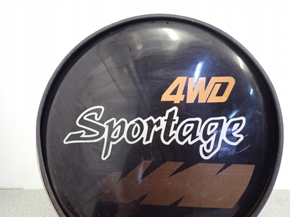 KIA SPORTAGE I 94- OBUDOWA OSŁONA KOŁA ZAPASOWEGO 3/4