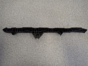 TOYOTA AVENSIS T25 KOMBI 02- ŚLIZG ZDERZAKA TYLNY PRAWY 3/4 MINIATURA