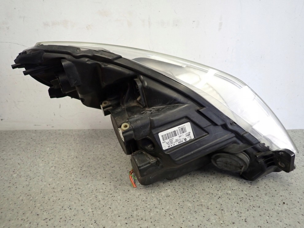 SUZUKI SPLASH 08-11 LAMPA PRZEDNIA LEWA REFLEKTOR 6/11