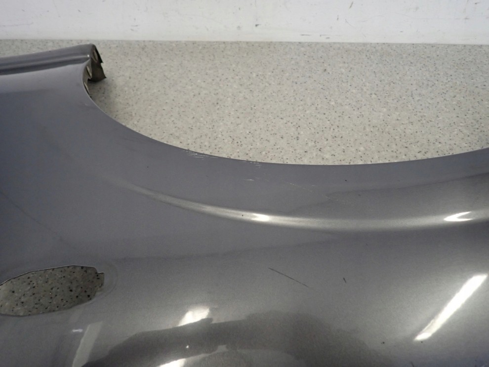 NISSAN ALMERA N16 03-06 BŁOTNIK PRZEDNI LEWY KY5 10/16