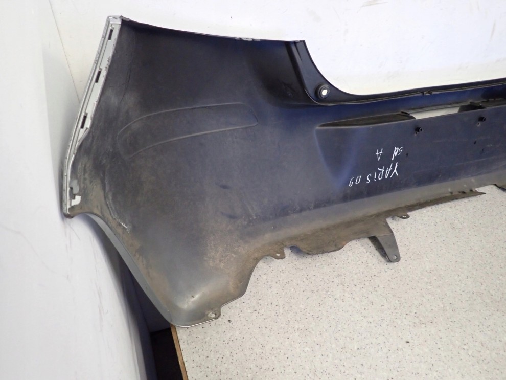 TOYOTA YARIS II 09-11 ZDERZAK TYLNY 1F8 13/14