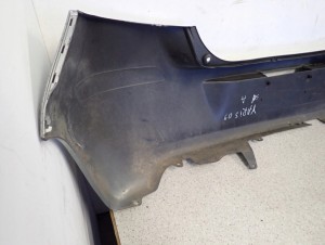 TOYOTA YARIS II 09-11 ZDERZAK TYLNY 1F8 13/14 MINIATURA