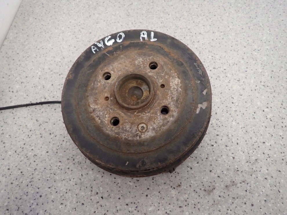 TOYOTA AYGO 05-12 BĘBEN HAMULCOWY TY LEWY TARCZA KOTWICZNA PIASTA SZCZEKI 1/7