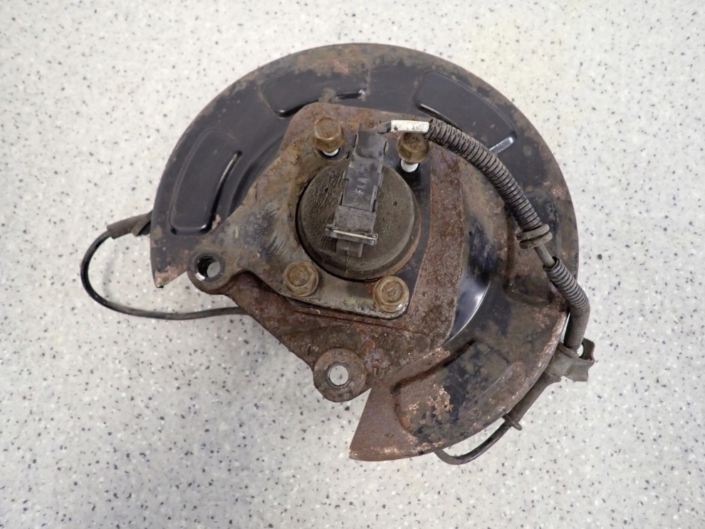 KIA VENGA 09- TARCZA KOTWICZNA ZWROTNICA TYLNA LEWA 4/5