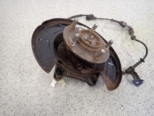 KIA VENGA 09- TARCZA KOTWICZNA ZWROTNICA TYLNA PRAWA 5/6 MINIATURA