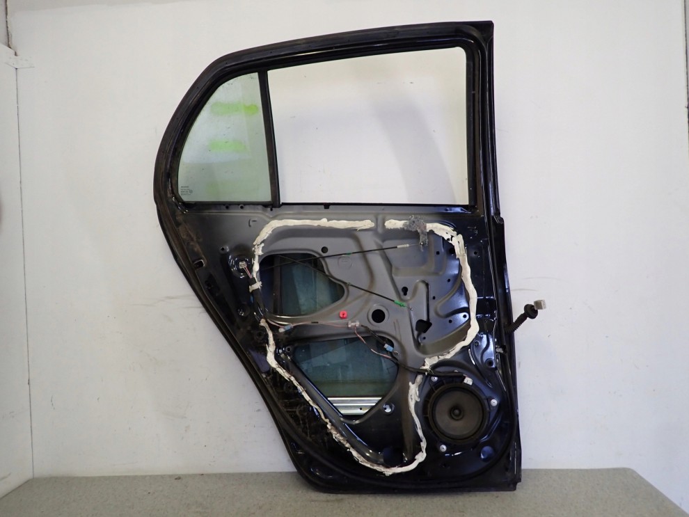 TOYOTA YARIS II 06-11 5d DRZWI TYLNE LEWE 209 13/14