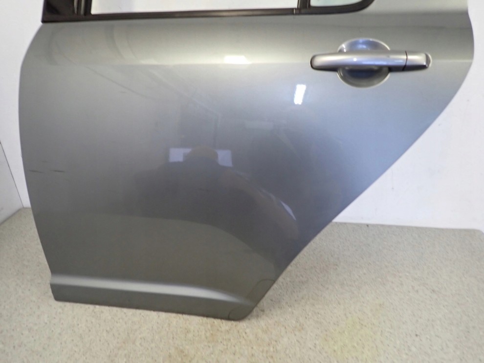 SUZUKI SWIFT 5d MK6 04-09 DRZWI TYLNE LEWE ZCD 7/11