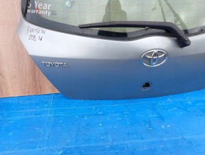 TOYOTA YARIS II 06- KLAPA TYLNA BAGAŻNIKA 1F8 10/12 MINIATURA