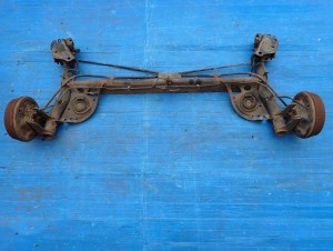 NISSAN MICRA K12 02-10 BELKA ZAWIESZENIA TYŁ 1/8 MINIATURA