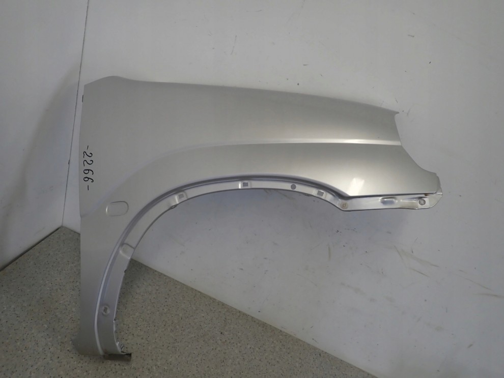 SUZUKI IGNIS I 00-03 BŁOTNIK PRZEDNI PRAWY Z2S 2/10