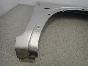 SUZUKI IGNIS I 00-03 BŁOTNIK PRZEDNI PRAWY Z2S 4/10 MINIATURA