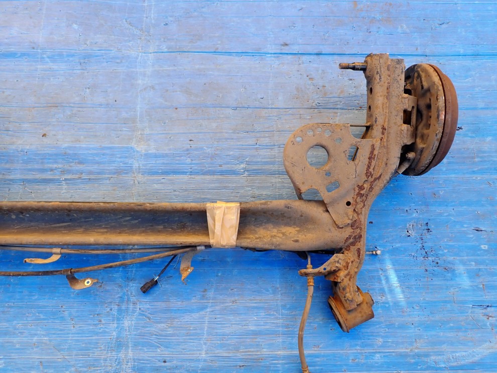 SUZUKI SWIFT MK7 10- BELKA ZAWIESZENIE TYŁ BĘBNY 10/10