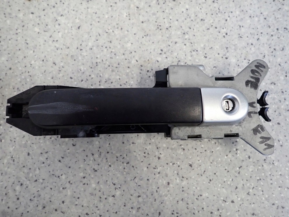 NISSAN NOTE E11 06-12 KLAMKA DRZWI PRZEDNIA LEWA 1/4