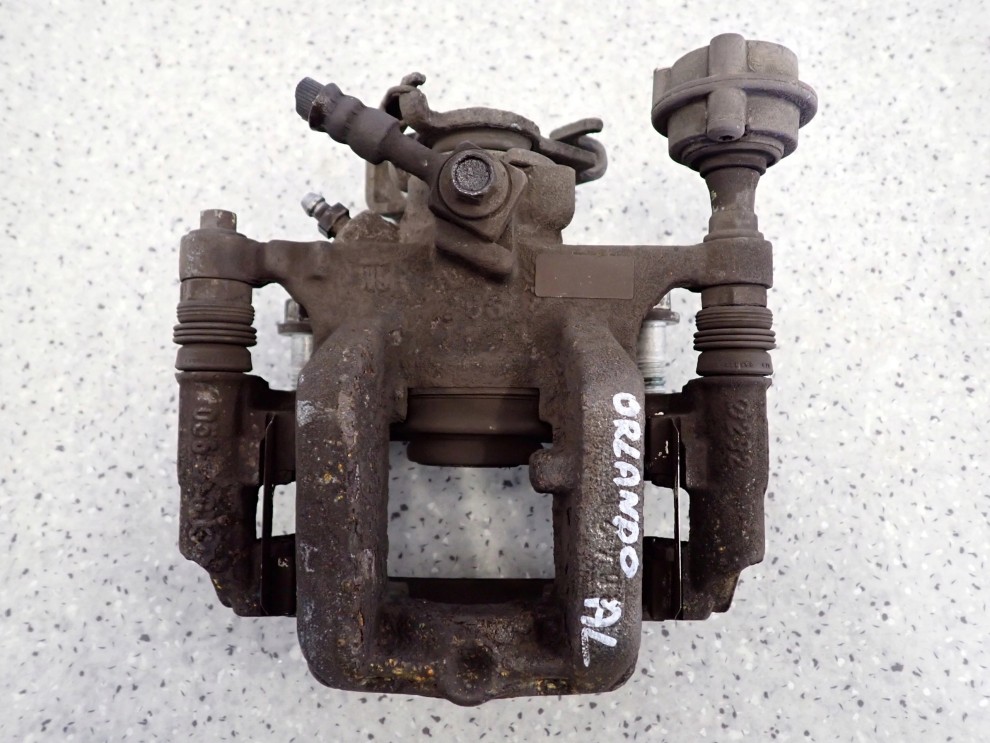 CHEVROLET ORLANDO 1.4i 10- ZACISK TYLNY LEWY 1/3