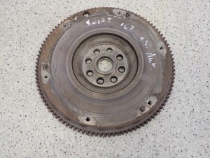 SUZUKI SWIFT M13A 1.3 04-09 KOŁO ZAMACHOWE AUTOMAT 2/7 MINIATURA