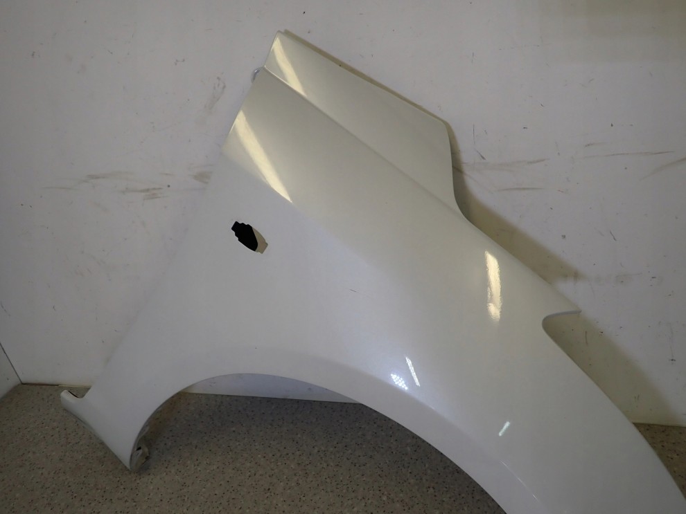 SUZUKI SWIFT MK7 10-16 BŁOTNIK PRZEDNI PRAWY ZNL 5/14