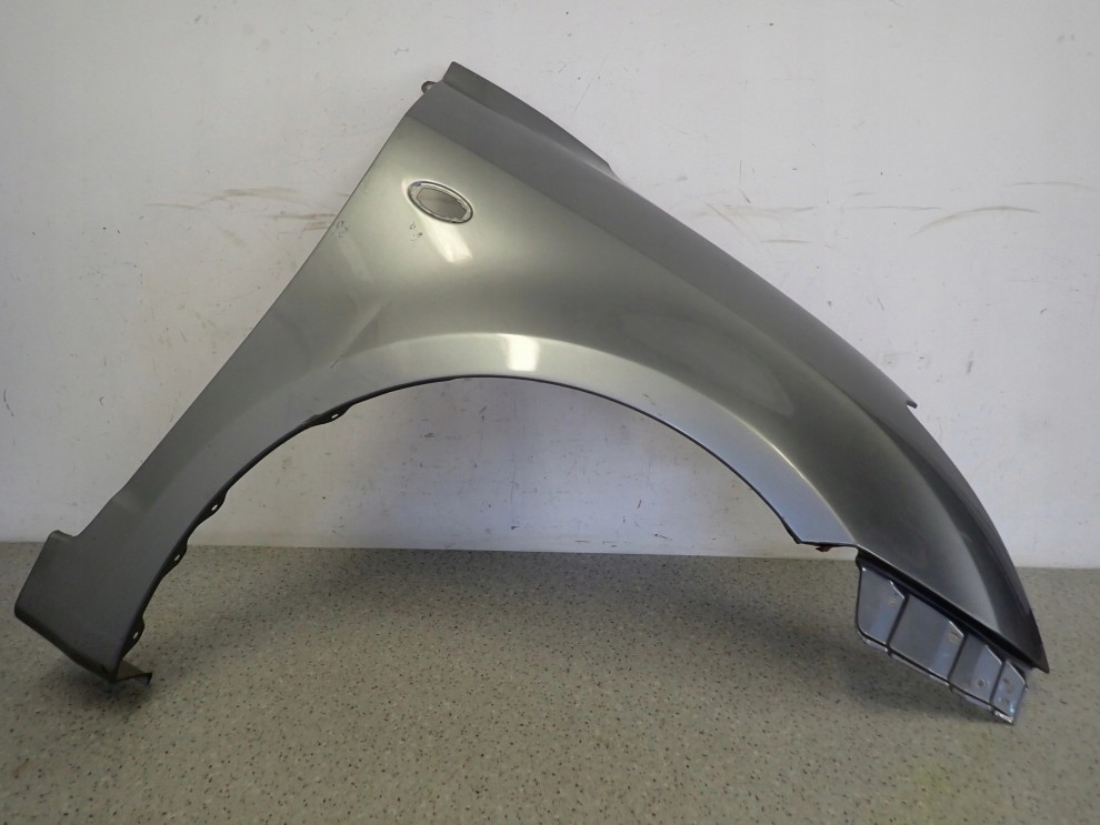 SUZUKI SWIFT MK6 05-09 BŁOTNIK PRZEDNI PRAWY ZCD 7/16